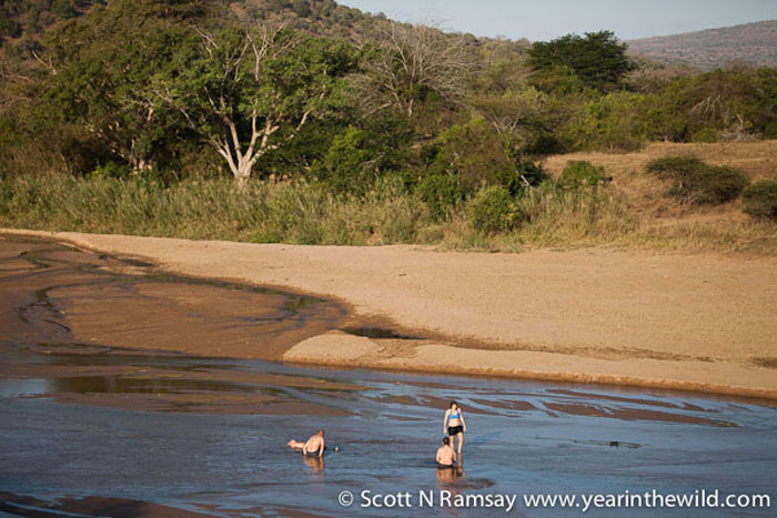 Washing off in the White Imfolozi River after a day's walking - at this time of year, in winter, the river here is too shallow for hippos and crocodiles, so it's perfectly safe to swim...if you keep a watch out for lions.