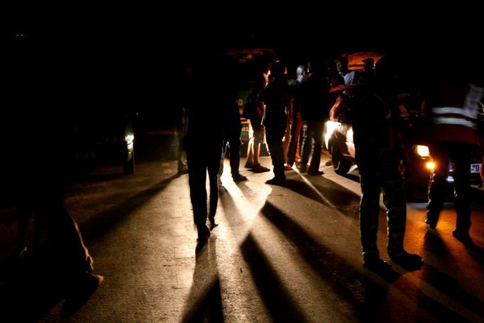13.At night these check points take on a completely different atmosphere: more chaotic, challenging and dangerous. Later into the night people are eager to compete their journey and become much less co-operative. This is when a strong team bond, something that Arthur F. Sniegon the head of the PALF dog program has fostered, helps the team to fight back their fatigue and remain motivated and focused.