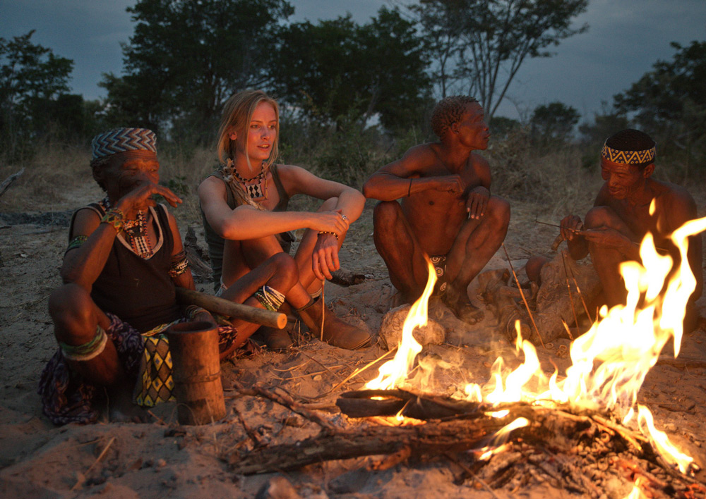 san-bushmen-and-model-around-fire