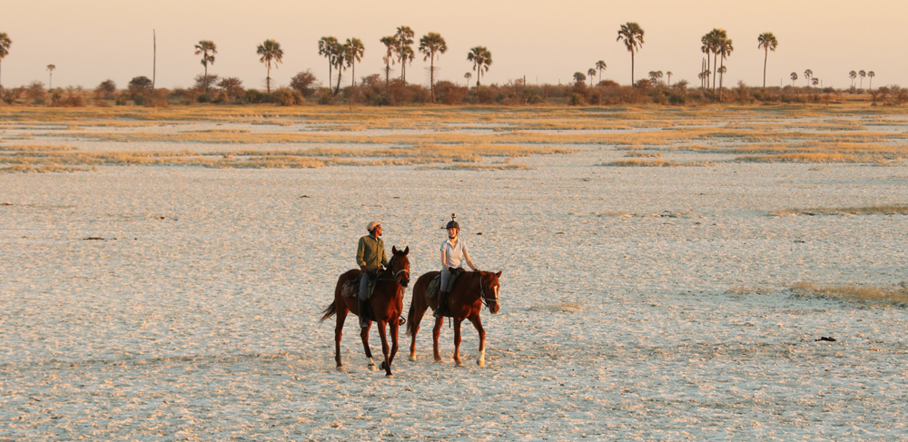 Riding on horseback across the salt pans