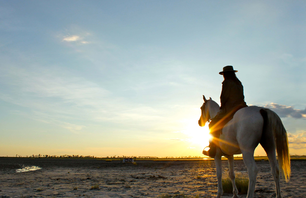 Sitting on horseback watching the sunrise
