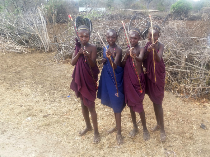 Four young Maasai warriros