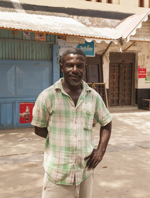 A local tourist guide in Lamu Town, Kenya