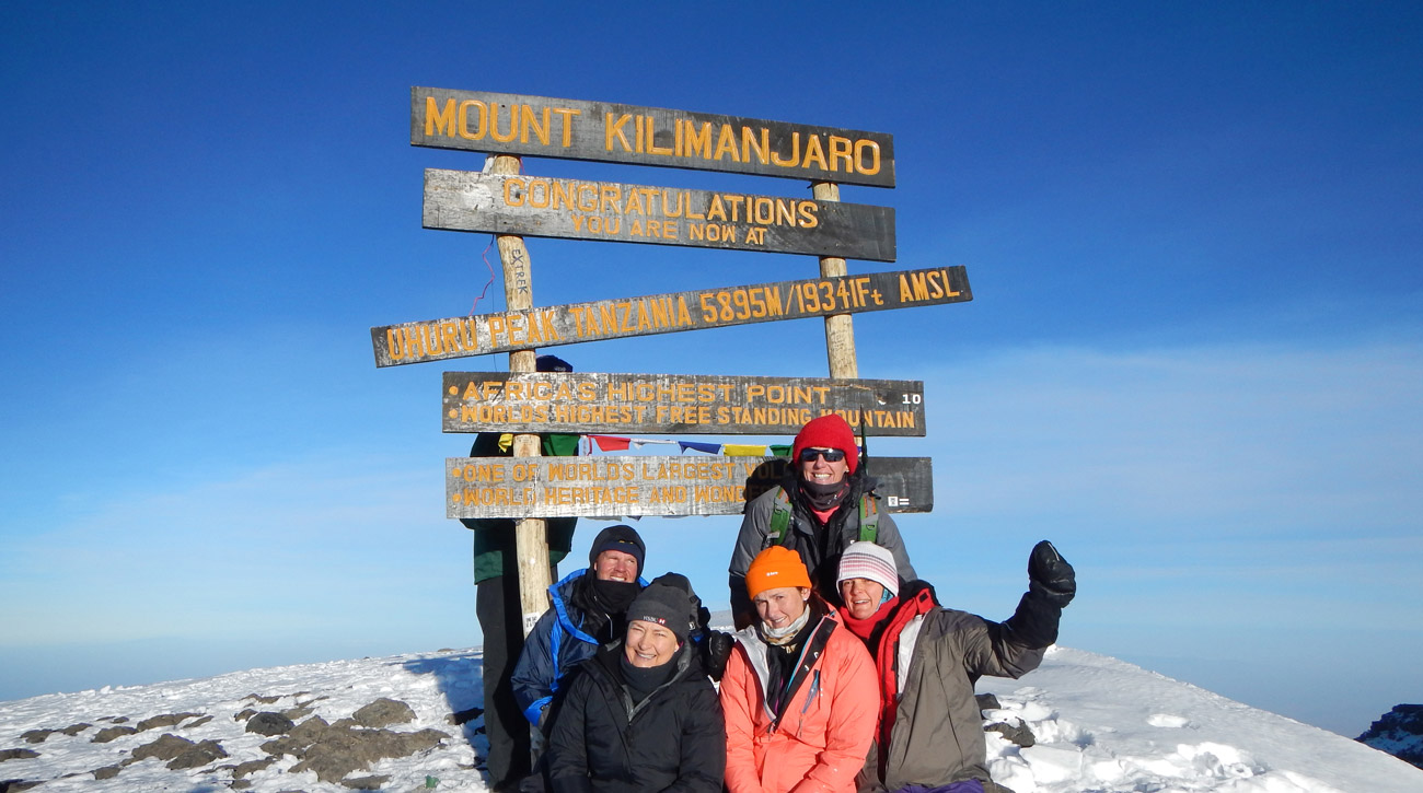 Summit of Mount Kilimanjaro with climbers
