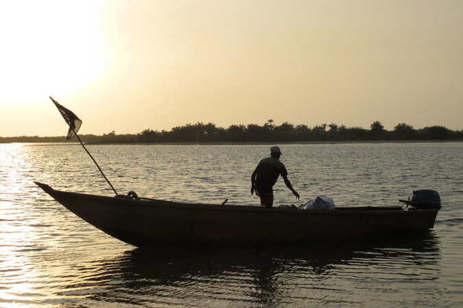 Mr Moses on the boat in Bakei, Turtle Islands, Sierra Leone