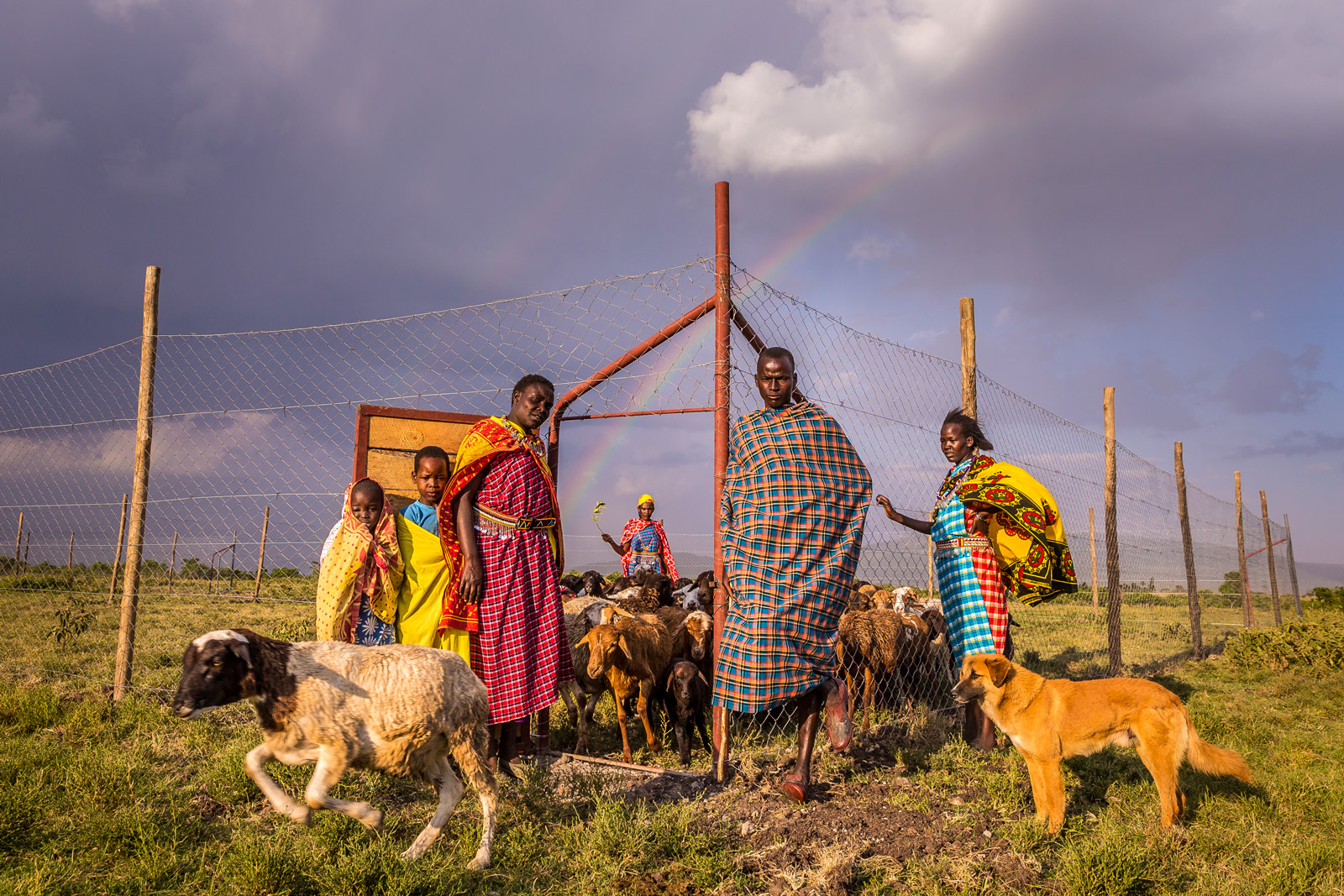 Maasai standing outside new boma