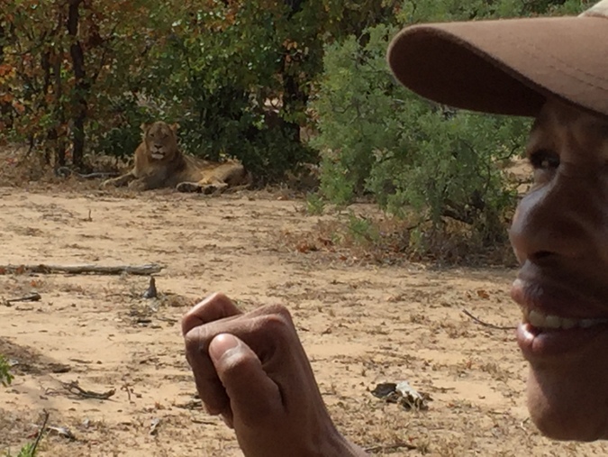 Master Tracker showing the sign for a lion in Kruger National Park