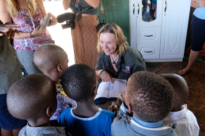 Carla Geyser talking with local school children