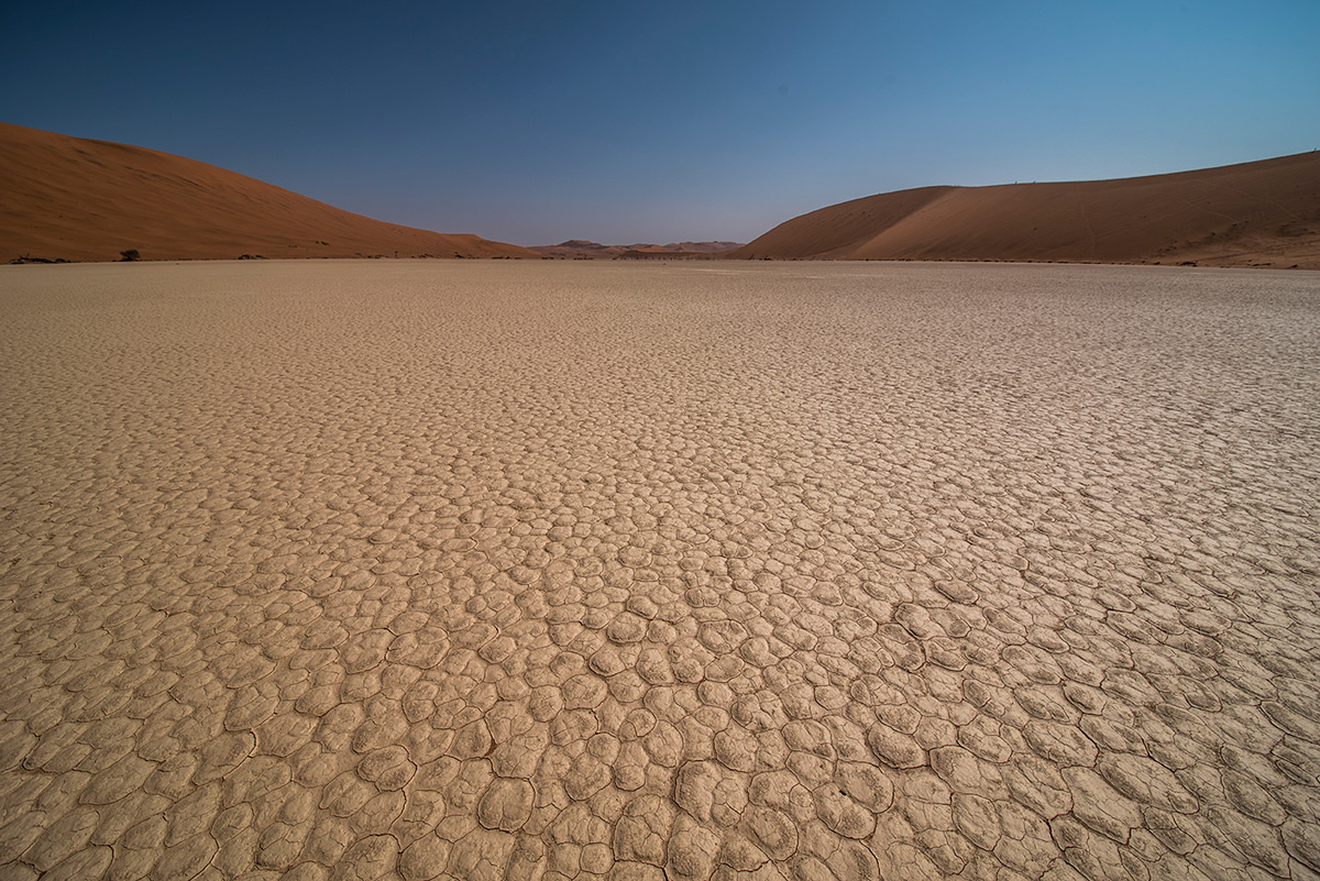 Dunes and dry sand in Sossusvlei, Namib-Naukluft National Park, Namibia © Melanie Maske