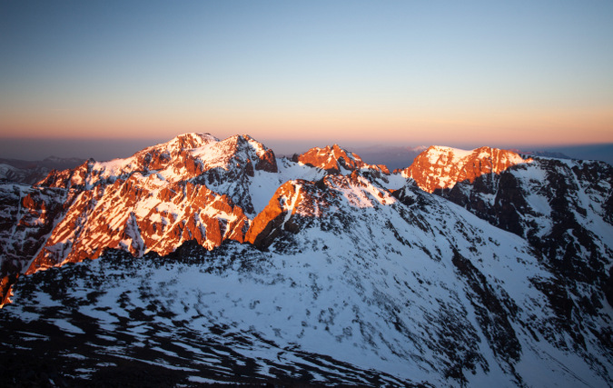 Sun hitting peak on Mount Toubkal, Atlas Mountains, Morocco