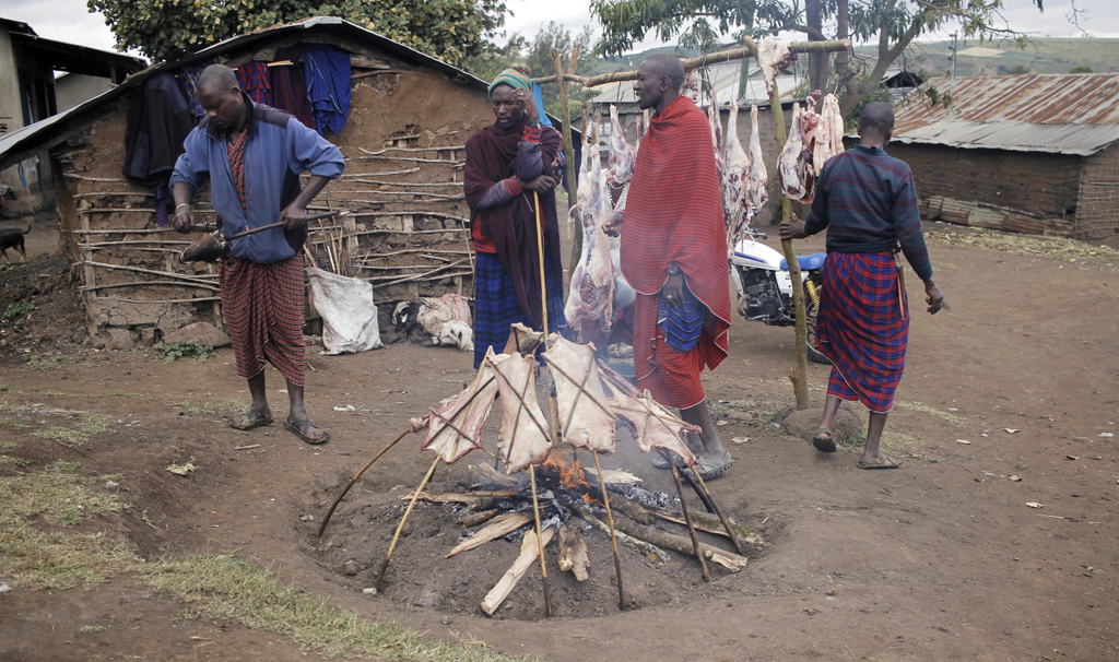 Mutton being cooked over open fire in Monduli Juu village in Tanzania