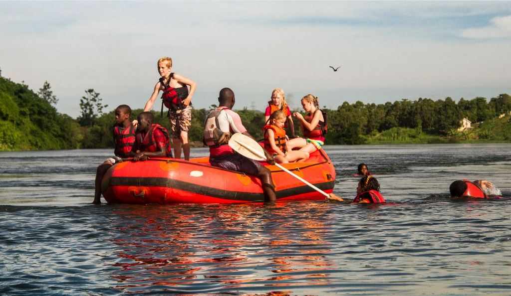 Kids enjoying a boat ride on the River Nile