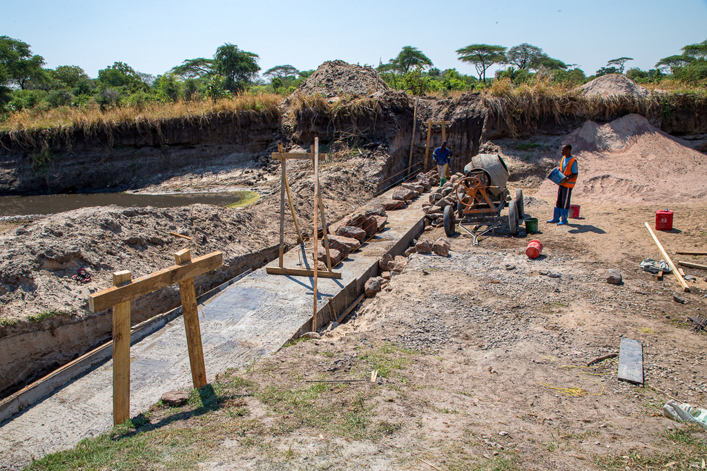 Workers constructing a dam in Kativi, Tanzania