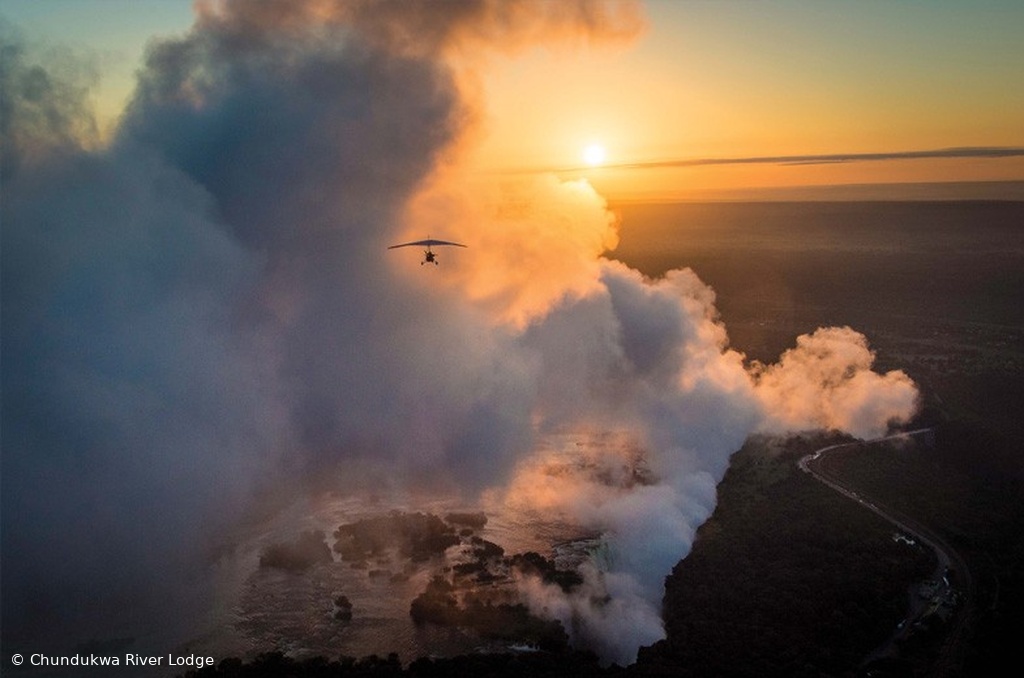 Micro-lighting over the Falls in full mist