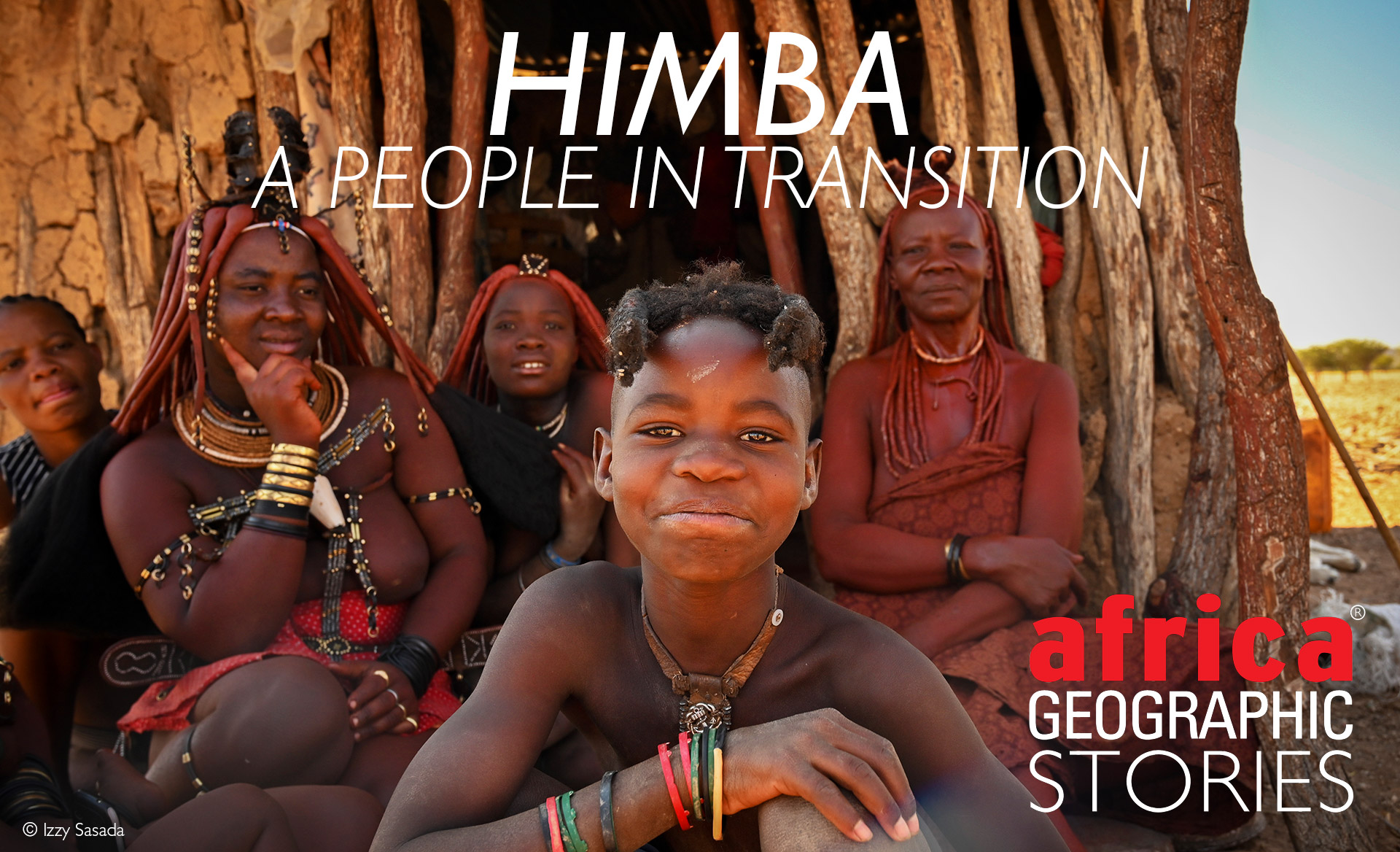 Smiling Himba girl with traditional jewelry